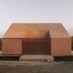 Casa Plaj cantilevered concrete holiday home by extrastudio architects overlooking the sea in Lourinhã, Portugal.