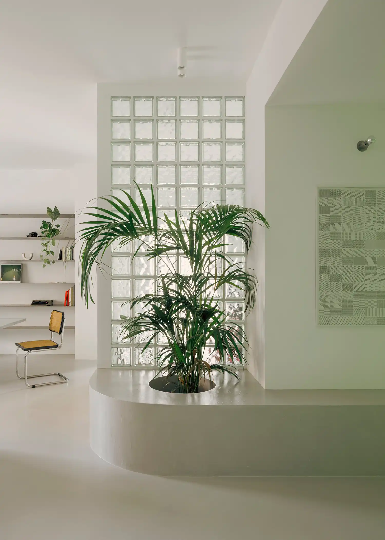 PAROS ARCHITETTURA Renovates Casa Tirreno with Fluid Glass-Brick Wall