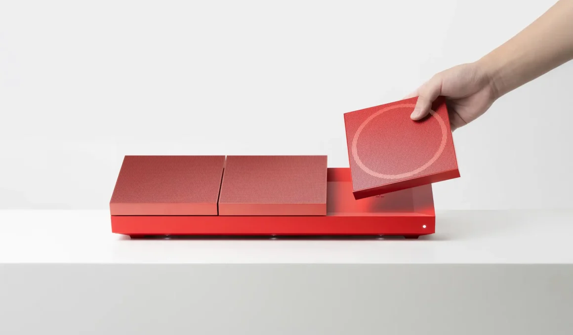 Hotcake modular magnetic speaker system showing wearable wrist strap and wireless daisy-chaining for collaborative music play.