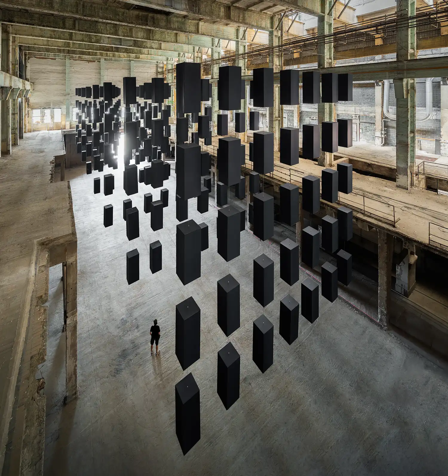 SpY Matriz Installation: Floating Grid Art in Budapest Turbine Factory