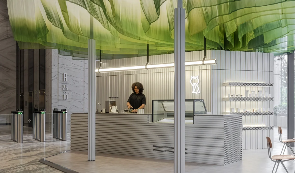 Niko Neko 5.0 Kuala Lumpur Spacemen Studio Matcha Café interior with aluminium bar and grey fabric curtains.