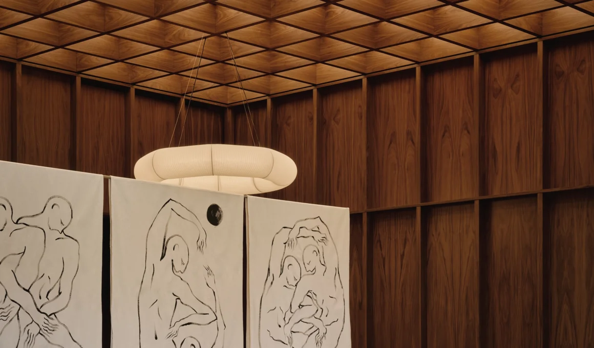 Atelier Carle designed OAKV Clinic reception area in Oakville Canada featuring double-height walnut cladding skylight and modern spa-like medical design.