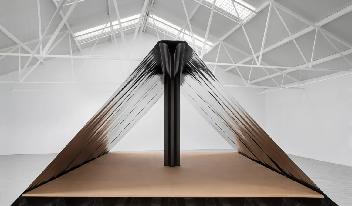 Close-up of Paloma Cañizares's six-meter rigidized fiberglass textile profile, showcasing its intricate geometric folds and structural form.