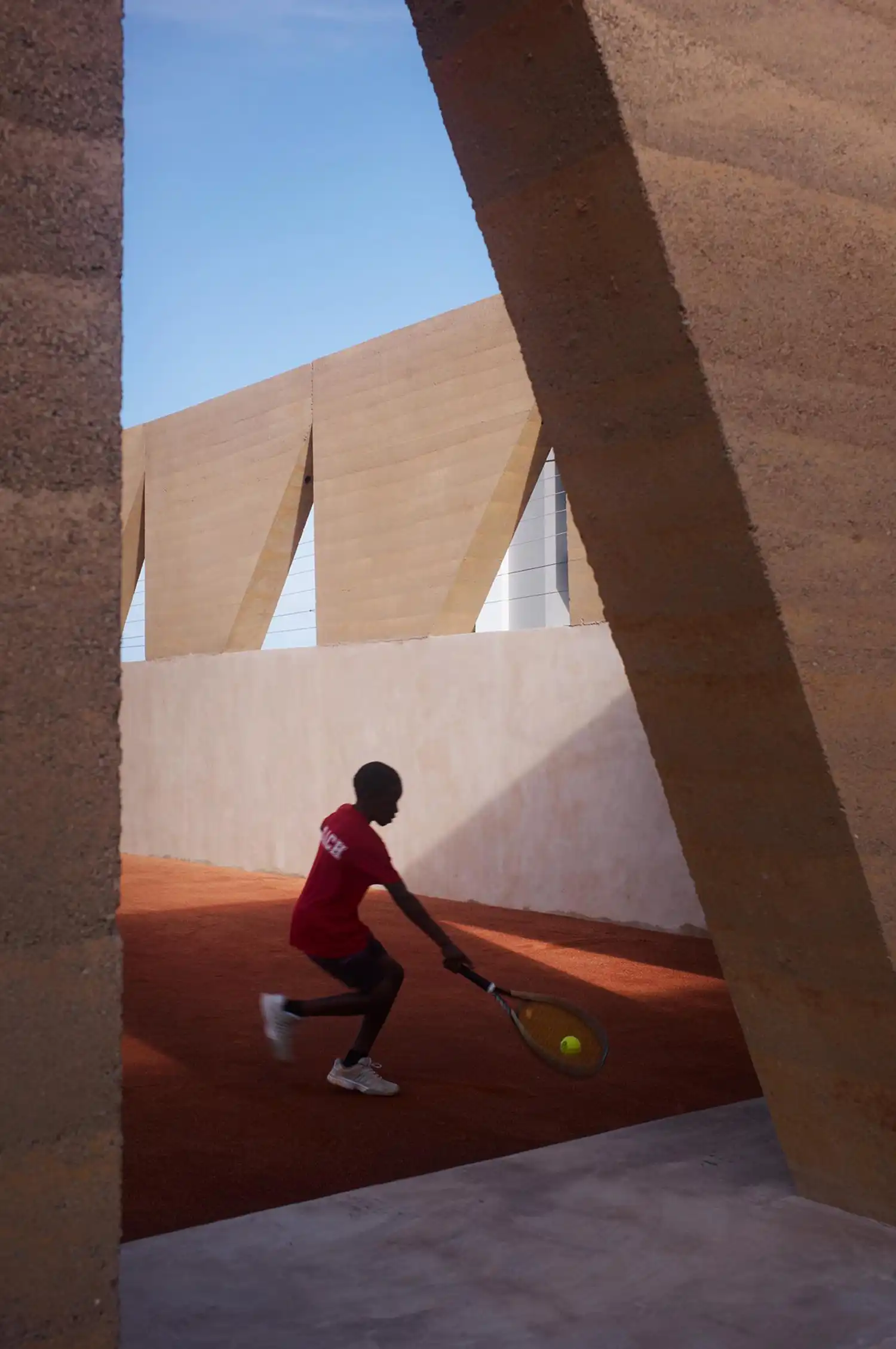 Rammed Earth Sports Club Defines New Civic Model in Accra, Ghana