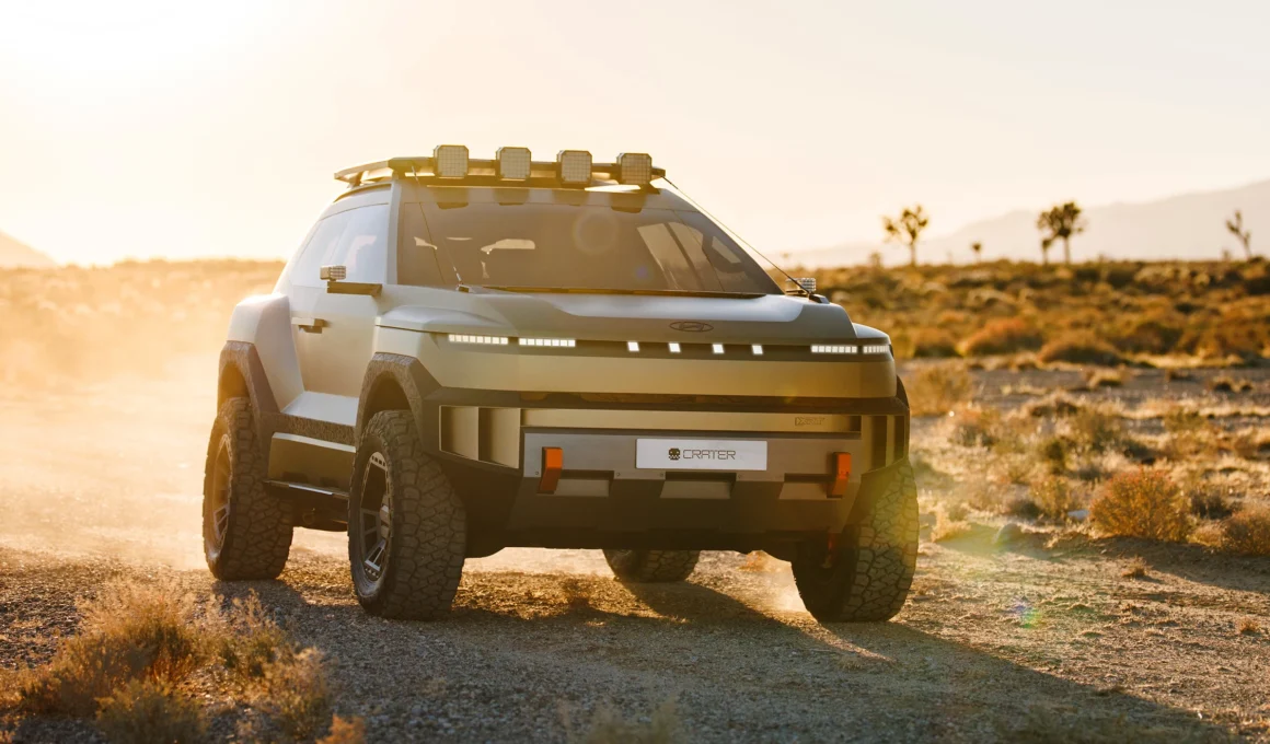 Hyundai CRATER Concept compact off-road SUV debut at AutoMobility LA 2025 showing Dune Gold Matte exterior finish and 33-inch off-road tires.