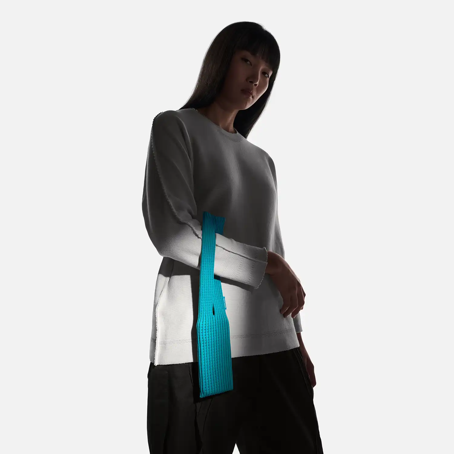 ISSEY MIYAKE & Apple: 3D-Knitted iPhone Pocket Accessory Unveiled