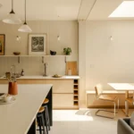 Noto Architects professional-grade kitchen with natural light and warm materials in Forest Hill House Victorian semi London.
