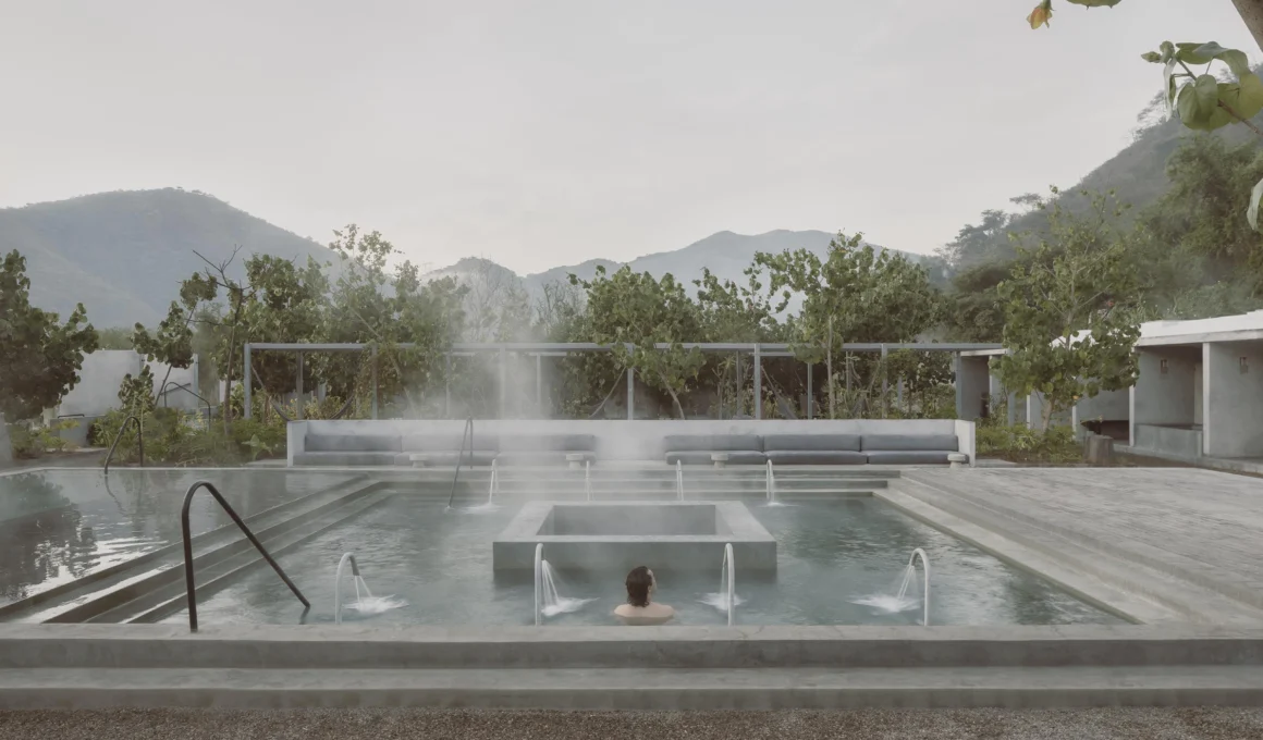 Pérez Gómez Arquitectura minimalist Hot Springs Garden main pool in Jalisco, Mexico; features an inverted pyramid design and concrete edges for thermal bathing.