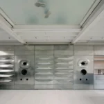 Salt Salon London Listening Room with roboformed metal speaker wall, Unknown Works design, galvanized steel, Borough Market interior.