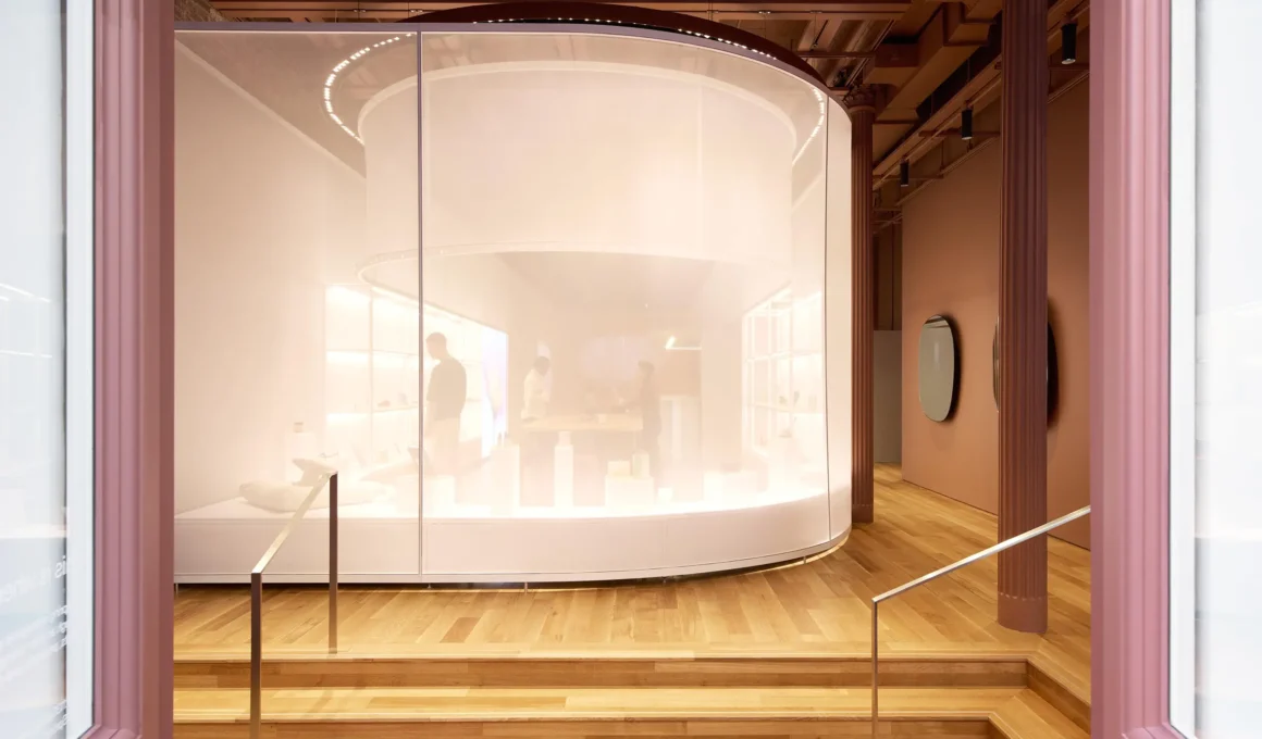 Snøhetta-designed 113 Spring in SoHo, NYC: A modern, minimalist retail and wellness living lab with flexible displays and natural light.