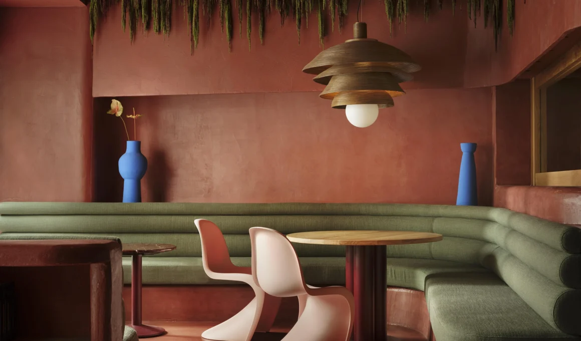 Pablo Roig Interior Design Superchulo Canalejas Madrid terracotta dining room curved wall Vitra chairs