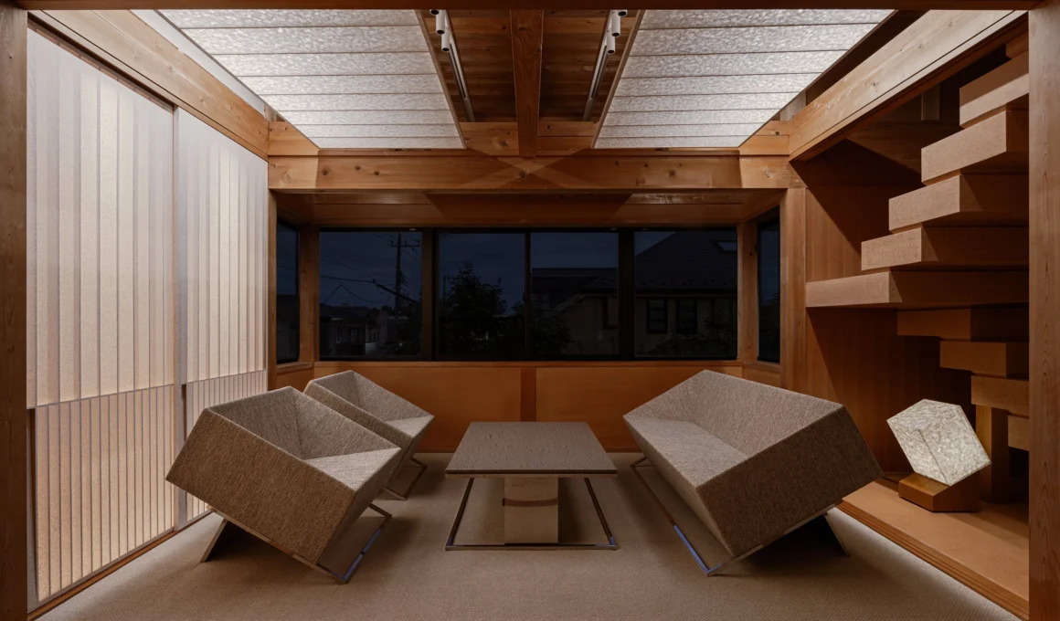 Symbolplus Office interior Tokyo, showing red clay plaster walls, exposed timber structure, and sustainable washi sliding screens.