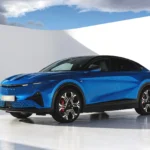 Alpine A390 Electric Sport Fastback 3/4 front view showing 'Cosmic Dust' LED signature and aerodynamic design.