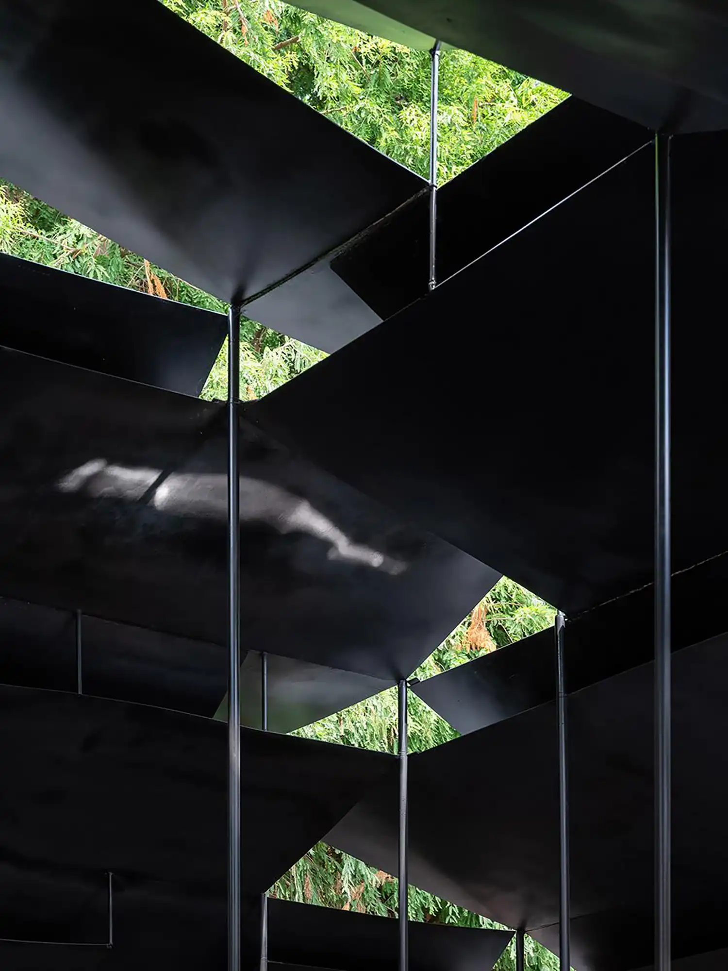 Atelier Deshaus’s Steel Pavilion Bridges Nature & Tech in Wetland