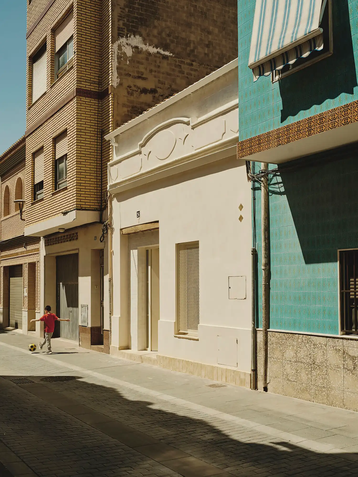 ENDALT Arquitectes Uses Rammed Earth and Reclaimed Brick to Revive Valencian Village House