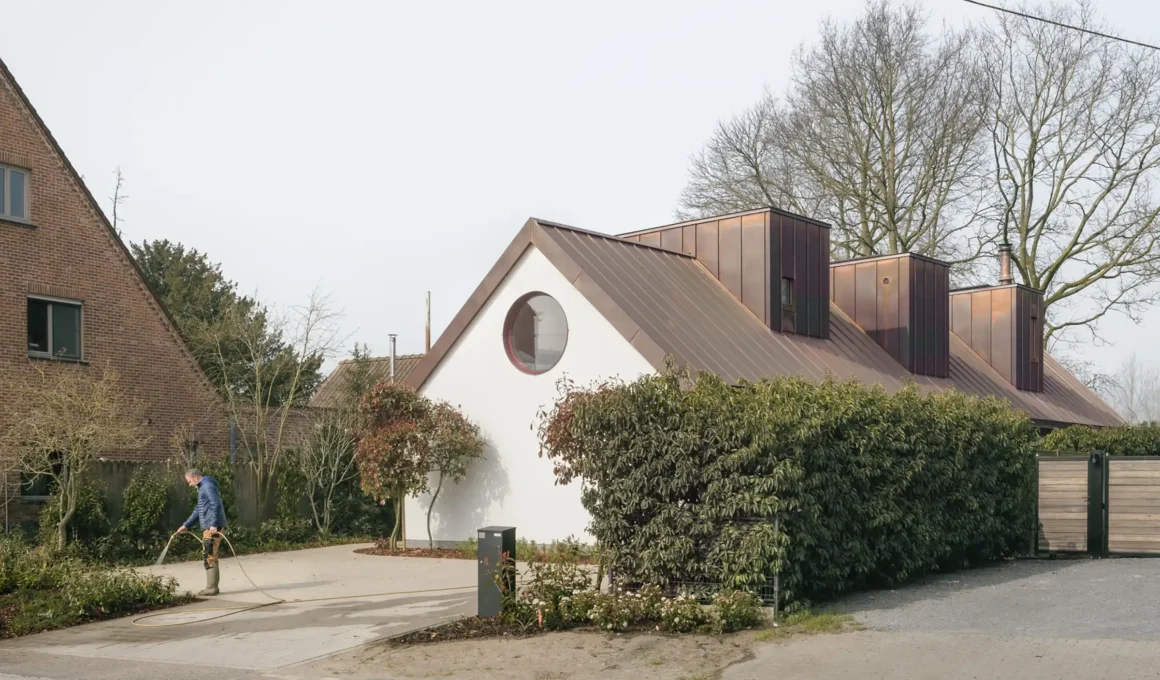 Curb view of the Home for Life in Ghent by FELT architecture & design, featuring single-storey accessible design and sculptural roof volumes.