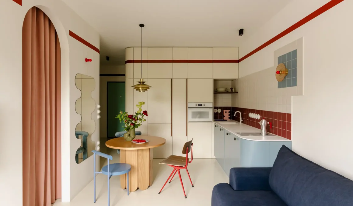 Ceiling-mounted curtain dividing modern open-plan apartment with kitchen, dining, and living zones.