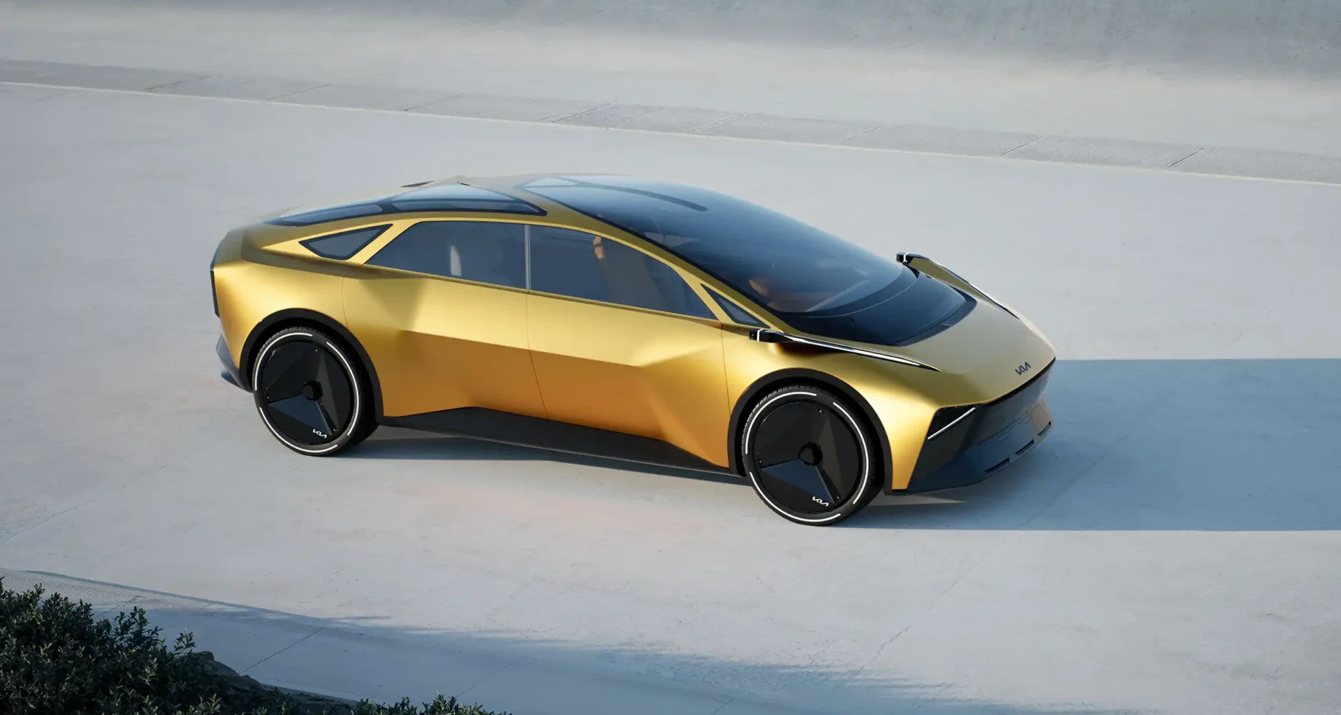 Kia Vision Meta Turismo concept car side view profile golden futuristic electric vehicle design.