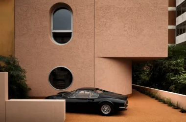 Locus Hobby House Pordenone facade: Curb view of cantilevered porch defining civic threshold architecture.