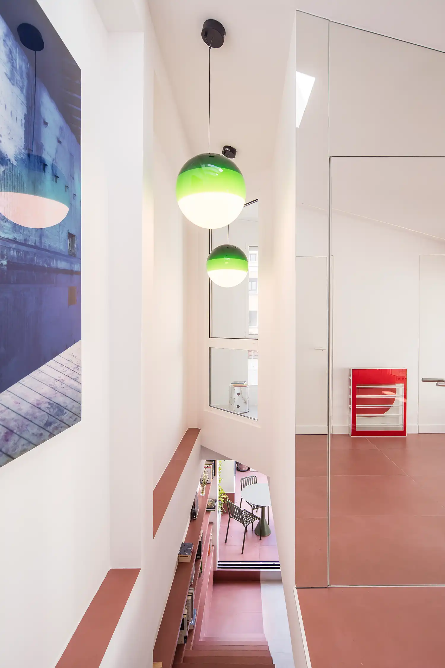 Gon Architects Uses a “Staircase-Furniture-Hybrid” to Open Up a Narrow Madrid Duplex
