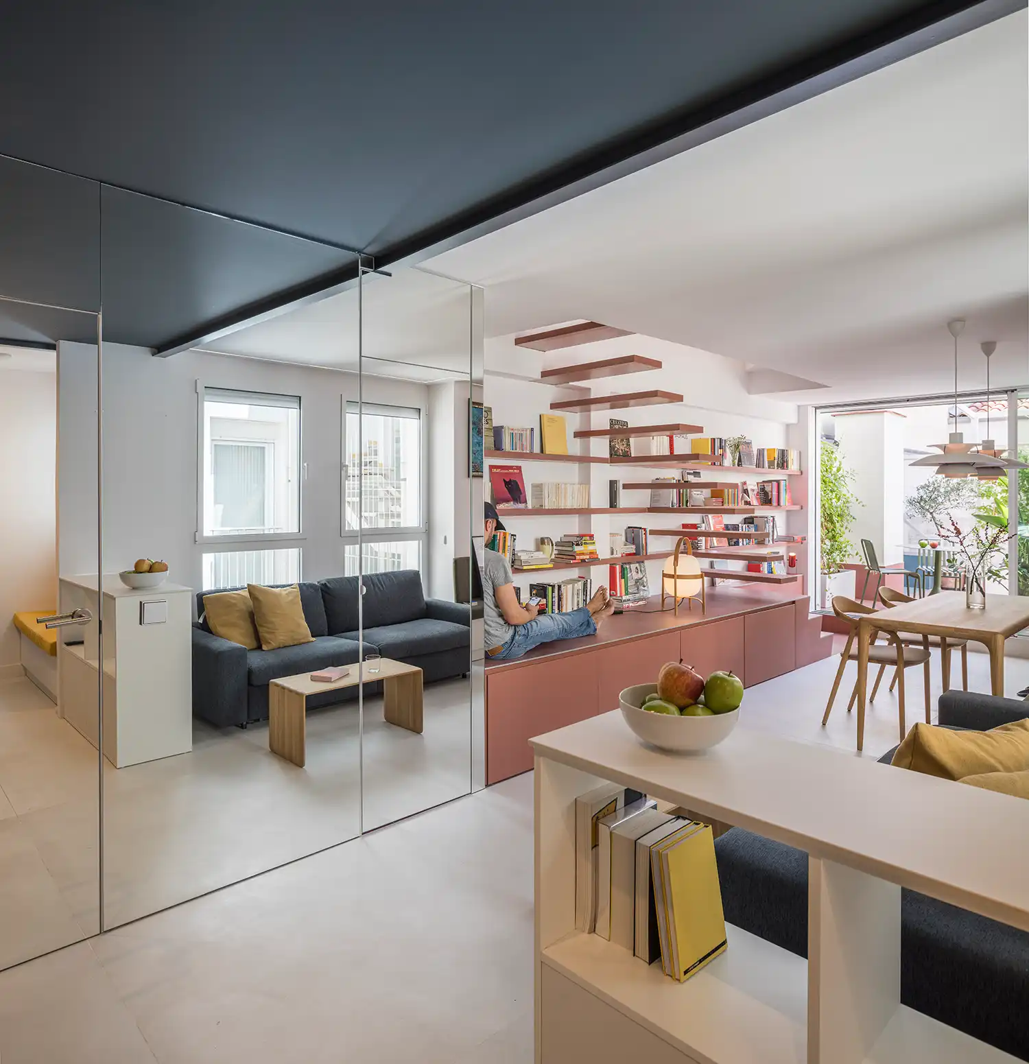 Gon Architects Uses a “Staircase-Furniture-Hybrid” to Open Up a Narrow Madrid Duplex