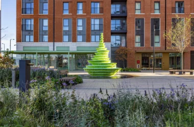 NEON’s asymmetric sculptural water fountain in green HI-MACS at Brent Cross Town, London