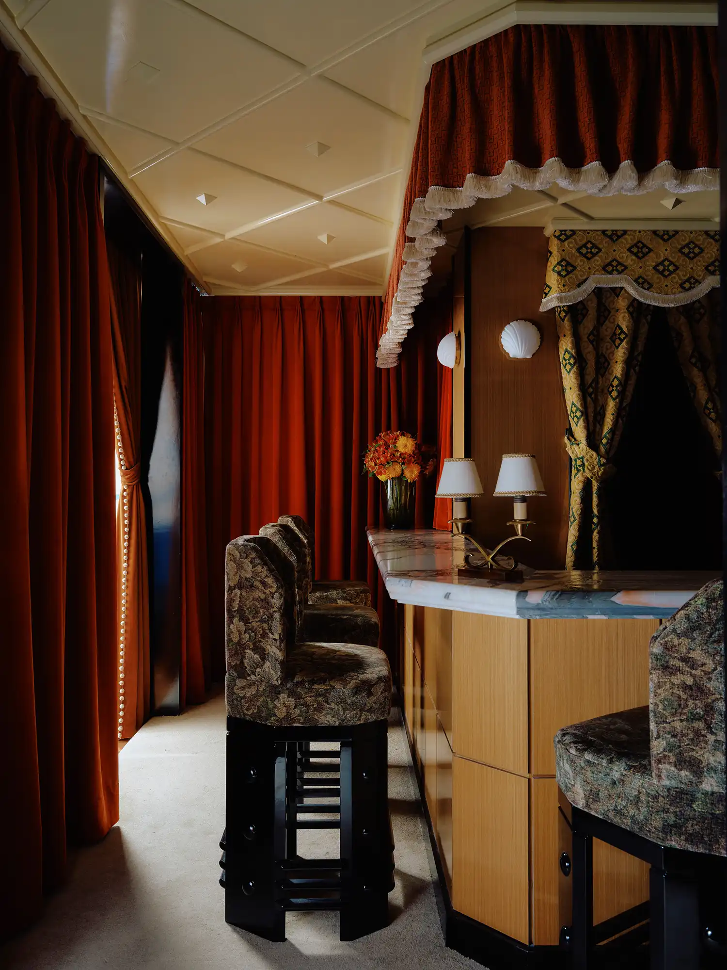 Ecru Studio Transforms 1970s Taipei Apartment Into a Patisserie With Velvet Reds and Ancient Motifs