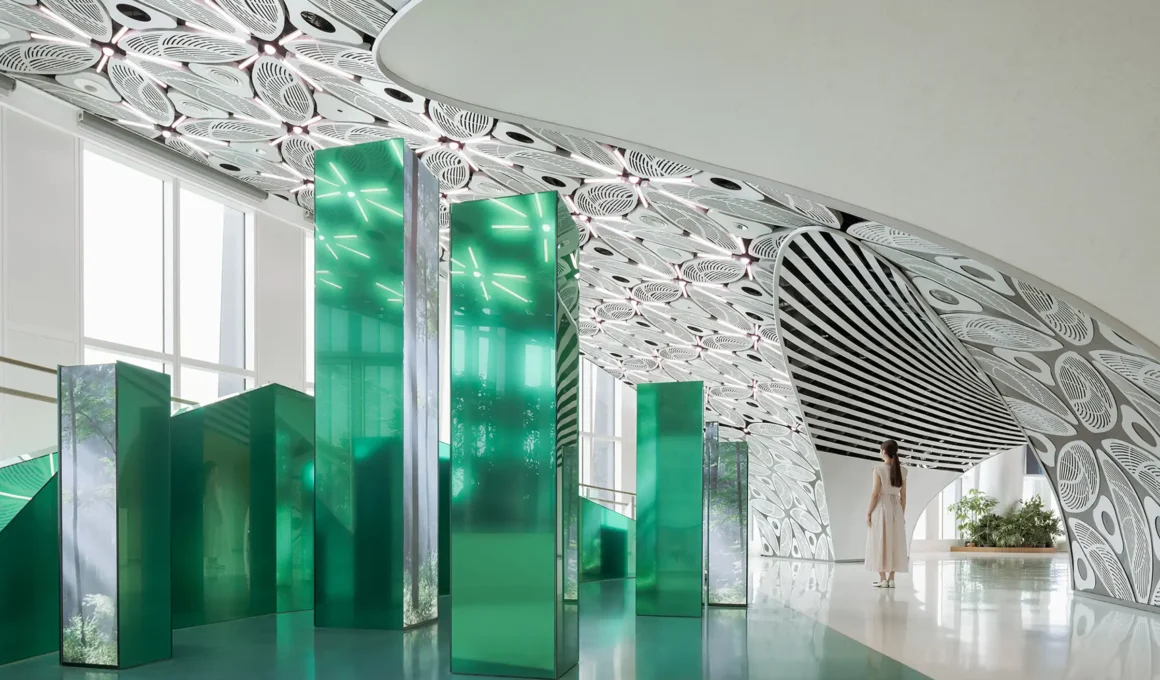 Wutopia Lab CXCC SUMMIT 58 interior design in Shanghai Urban Observatory with green illuminated glass columns and perforated snowflake ceiling architecture.
