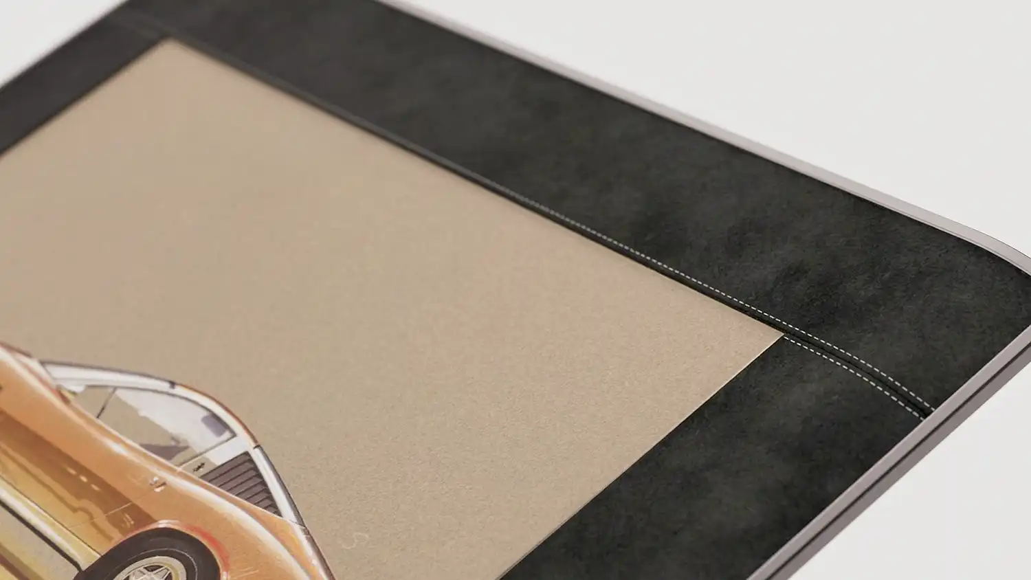 Macro detail of Pininfarina Duna Alcantara frame and stitching