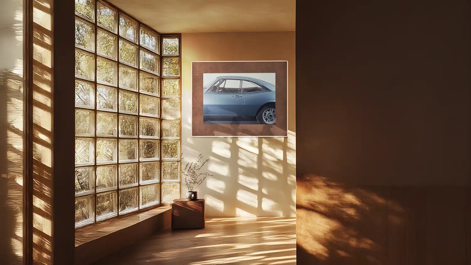 Duna digital poster in a warm living space with glass block wall