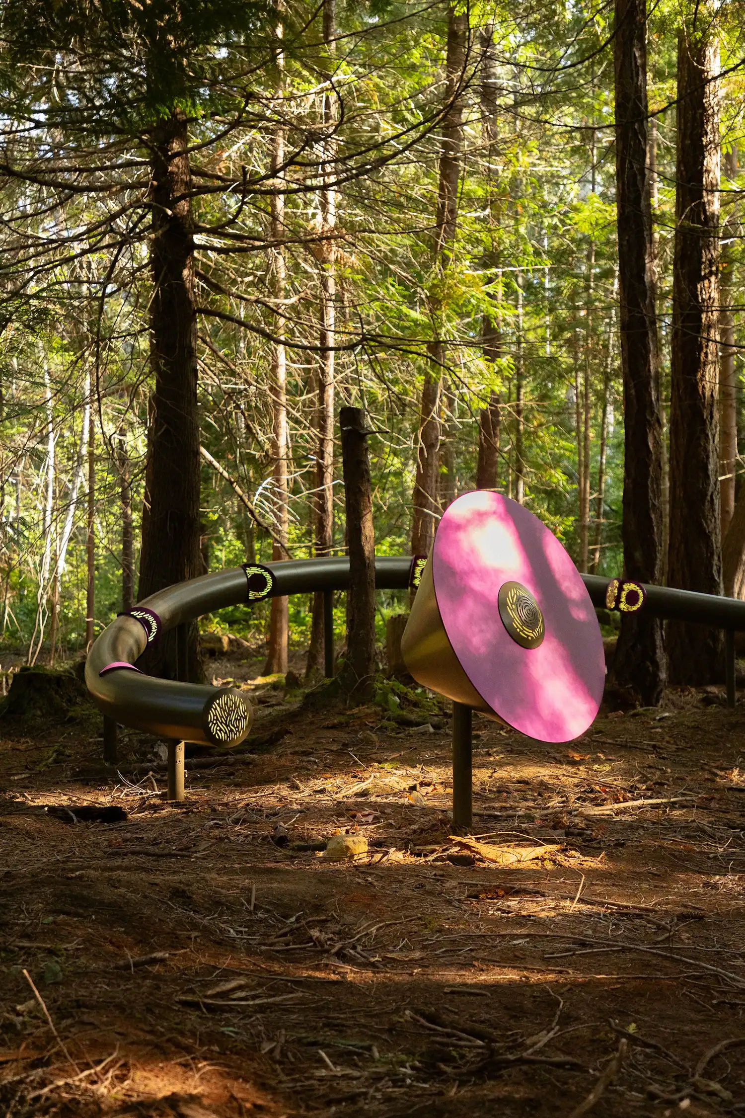 Sculptural purple dish and curved metal structure of Forest Mixer.