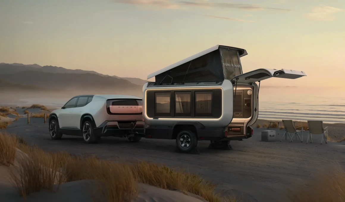 Honda Base Station Prototype with pop-up roof extended and rear tailgate open on a misty beach at sunset, showcasing its modular camping architecture.