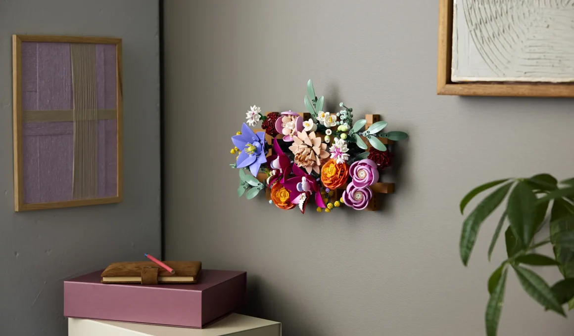 Horizontal LEGO Flower Wall 11503 on a grey interior wall with lifestyle accessories.