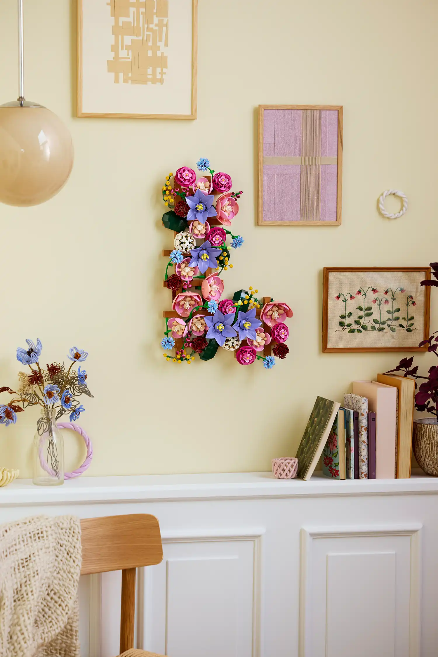 L-shaped LEGO Flower Wall installation in a curated interior.