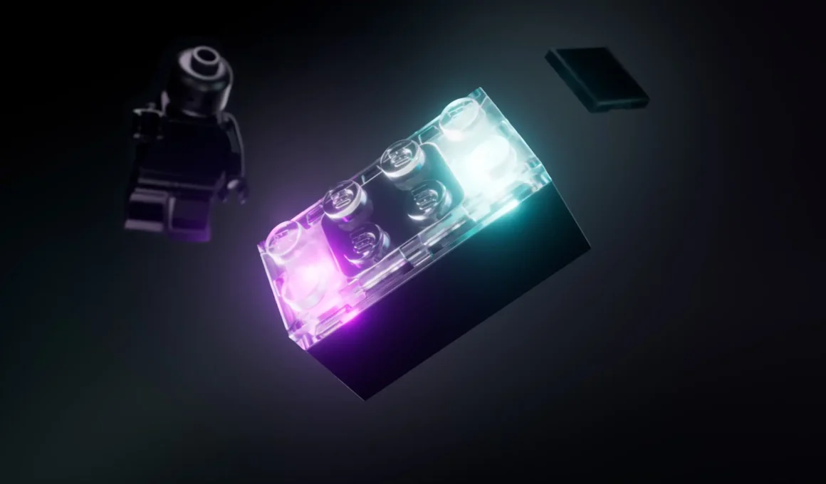 A translucent LEGO SMART Brick glowing with internal purple and cyan light, showcasing the integrated circuitry and miniature speaker system developed by the Creative Play Lab for CES 2026.