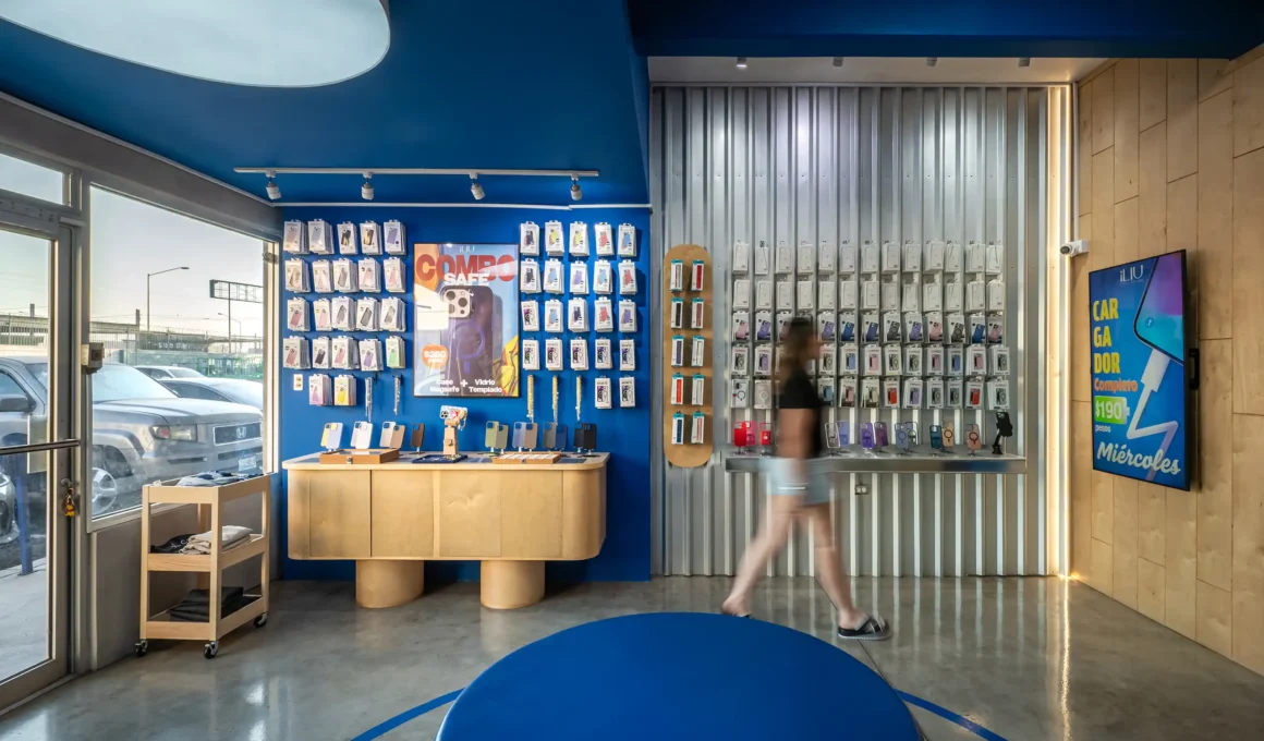 ILIU Cell Store interior with central blue ottoman and circular floor path on concrete.