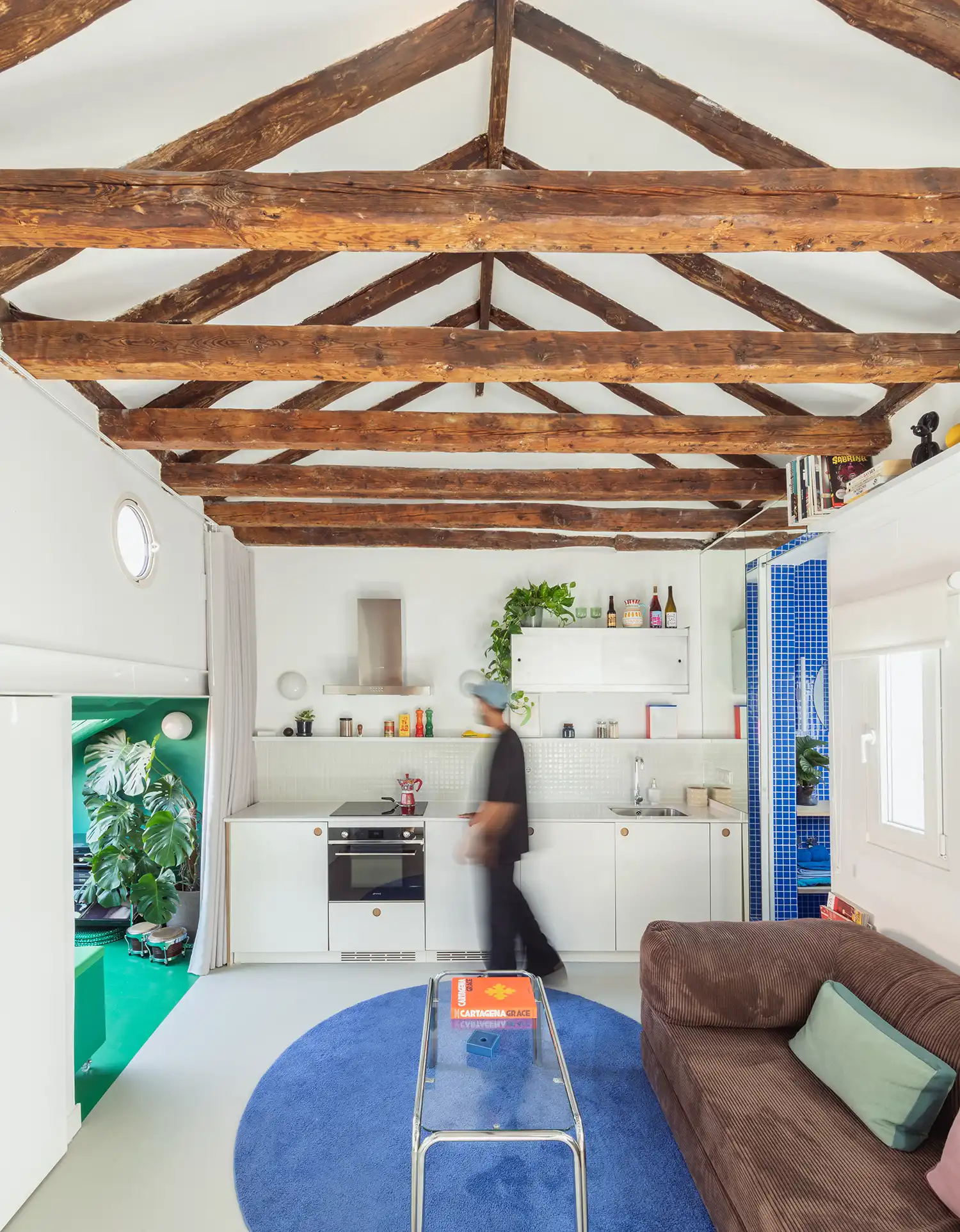 Midori Arquitectura Uses “Vibrant Satellites” of Color to Organize 30-Square-Metre Madrid Attic