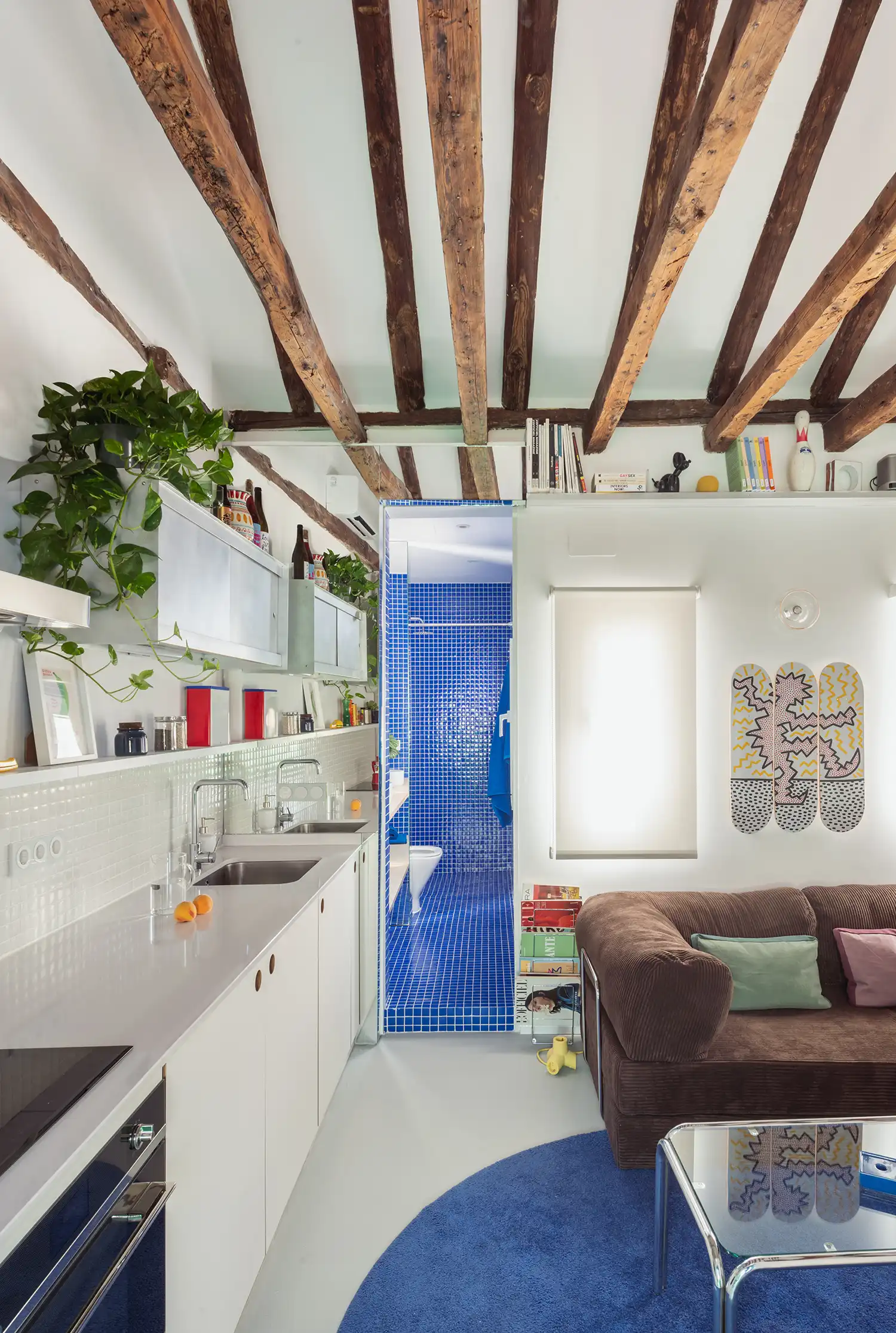 Midori Arquitectura Uses “Vibrant Satellites” of Color to Organize 30-Square-Metre Madrid Attic