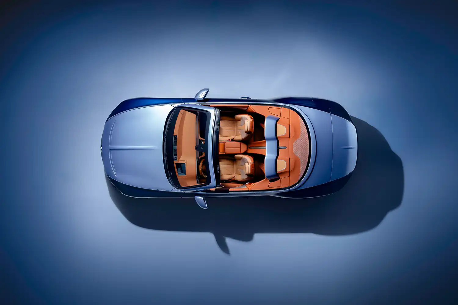 Aerial view of Batur Convertible #4 showing tan leather interior and Breslow Blue airbridge