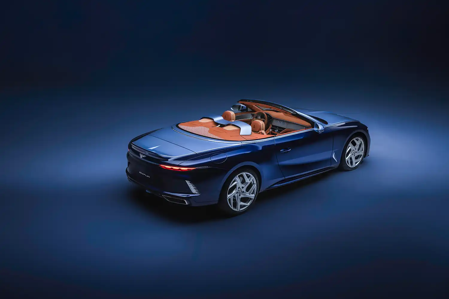 Rear three-quarter view of Bentley Batur Convertible #4 with polished titanium exhausts