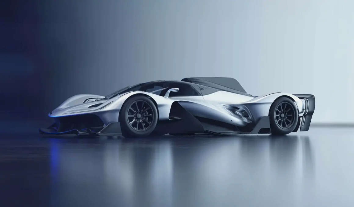 Low-angle side view of the RB17 hypercar, emphasizing its grounded stance, large racing wheels, and the complex aerodynamic sculpting of the side venturi tunnels.