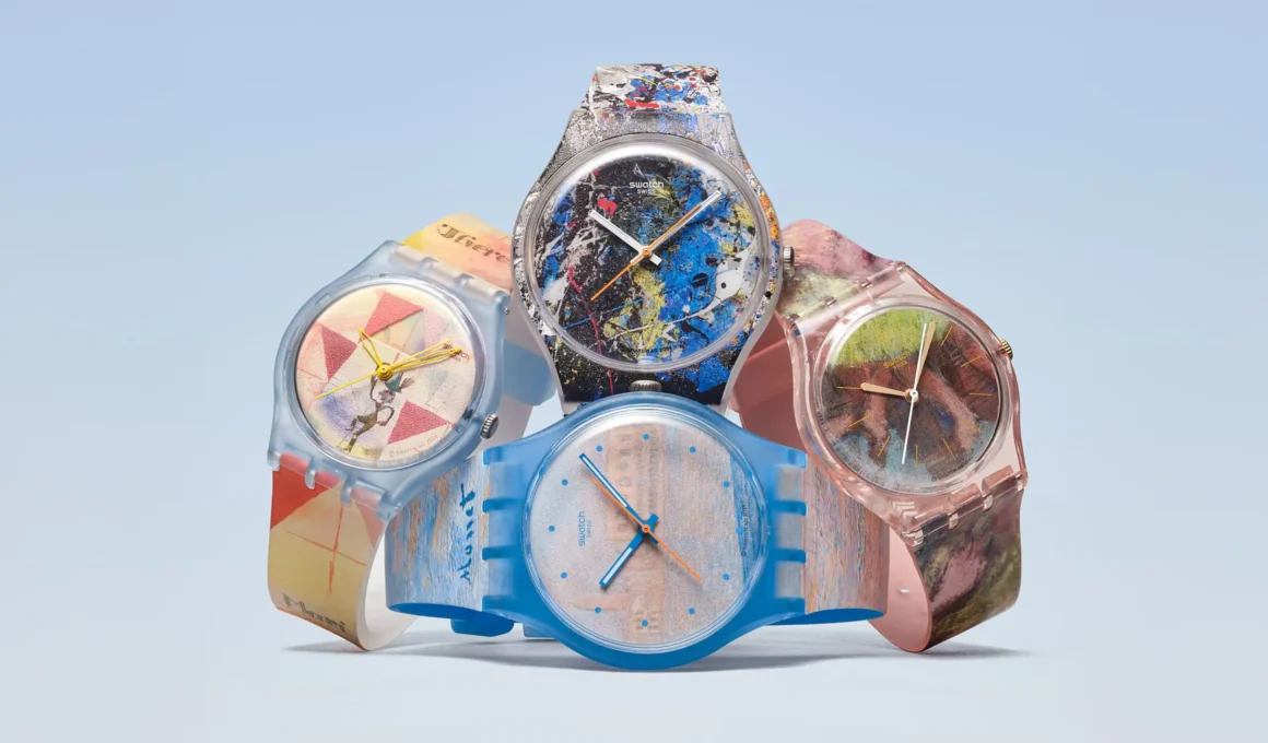 Four Swatch x Guggenheim watches artistically stacked against a soft blue gradient.