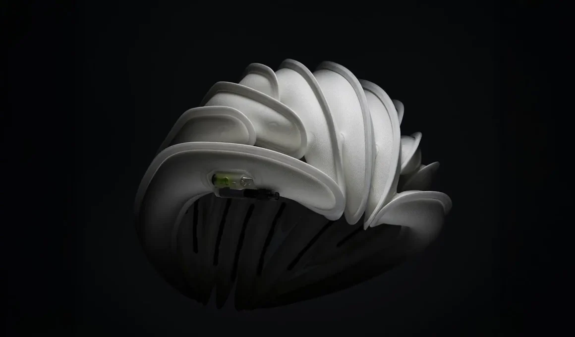 Close-up of the white Ventete aH-1 inflatable helmet against a dark background.