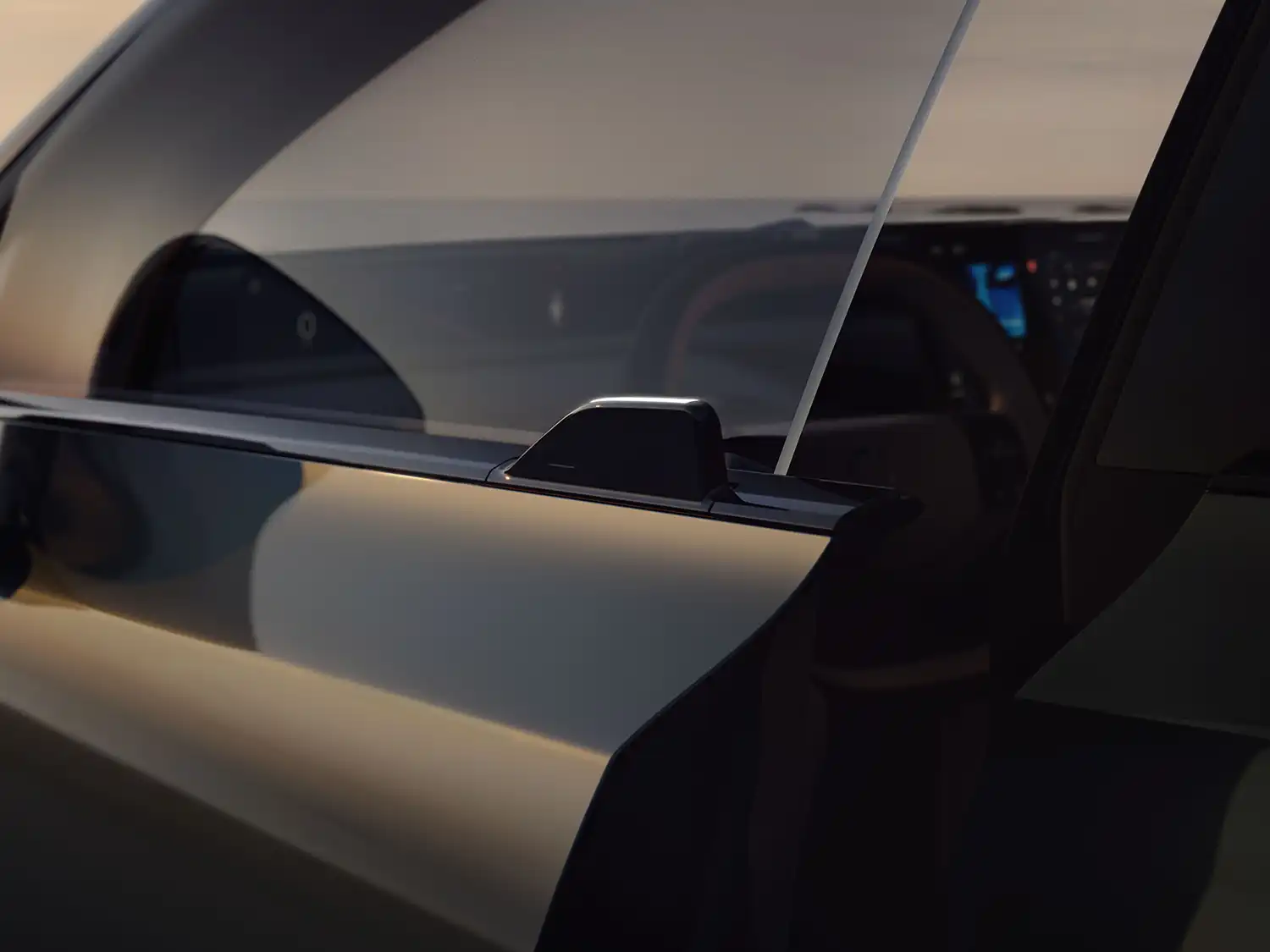 Close-up of the Volvo EX60’s minimalist touch-to-open sensor integrated into the door panel.