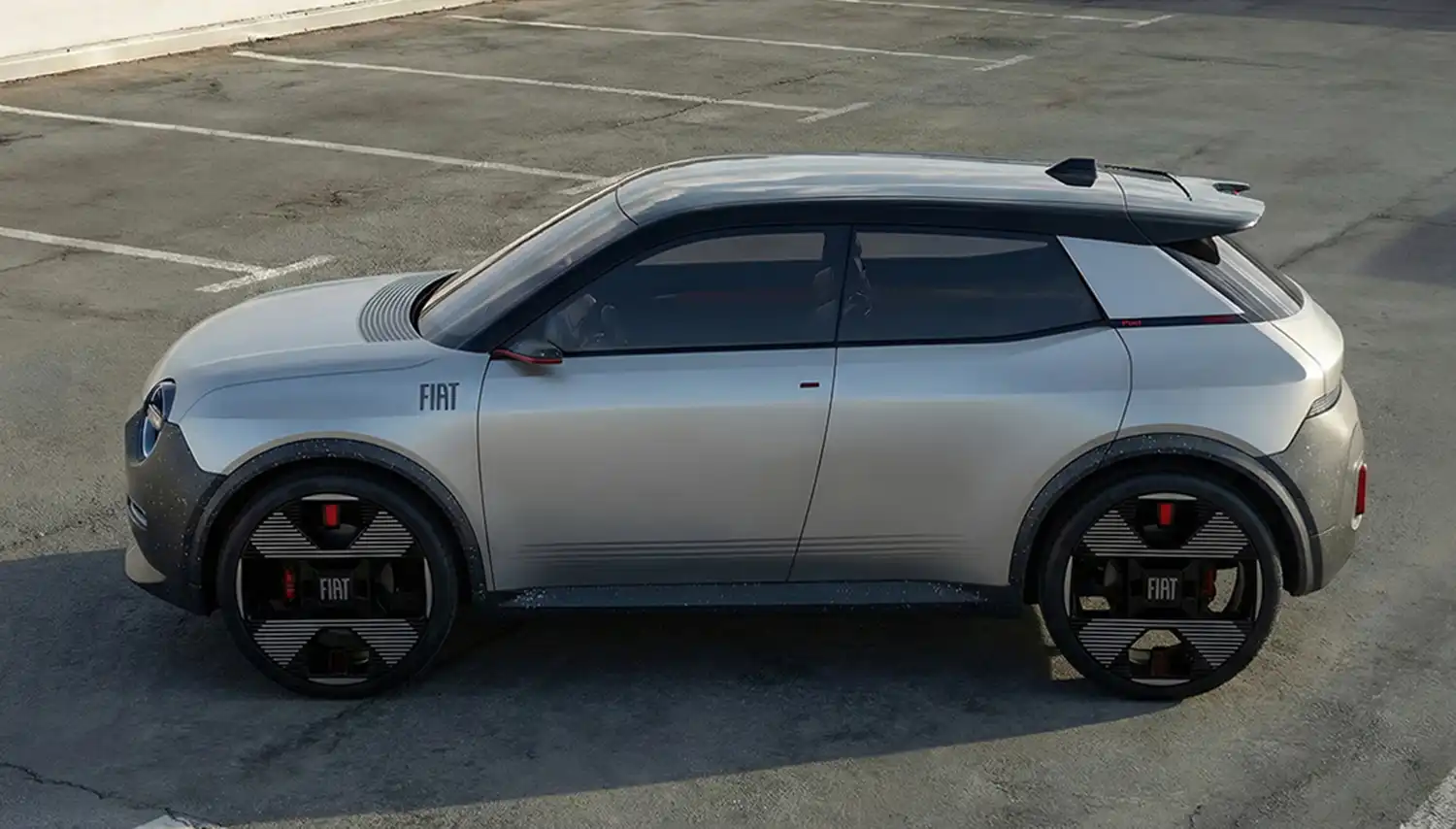 Flat side profile of the silver Fiat Ritmo concept with black aero-wheels
