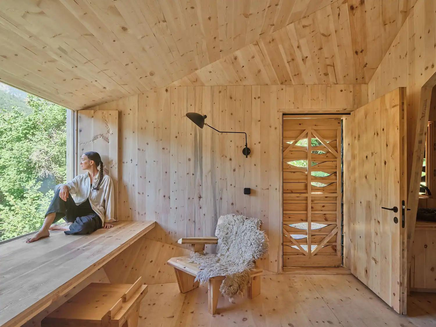 IAAC Forestone interior CLT walls mountain view occupant