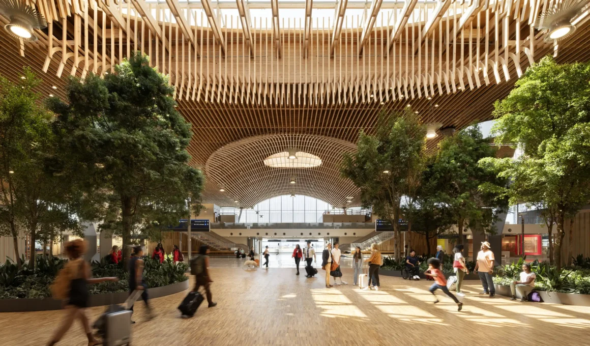 Modern airport terminal interior designed for seamless travel flow, referencing the PDX renovation by ZGF Architects.