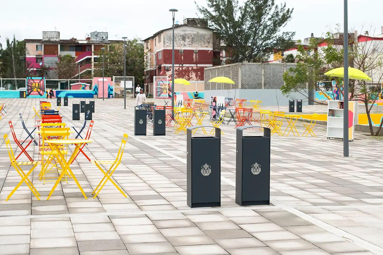 Civic plaza with social seating and modern urban furniture in Veracruz.