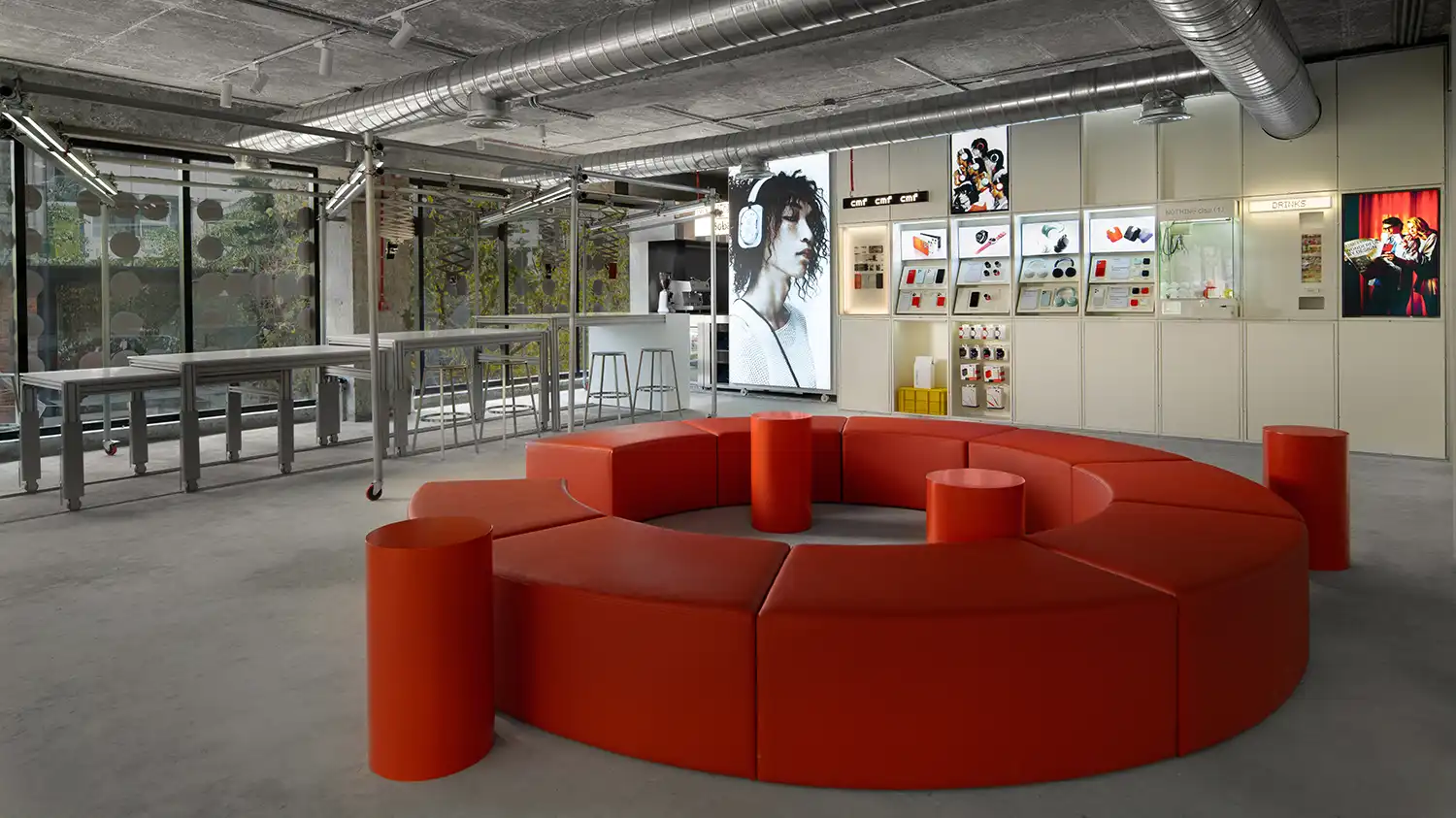 Industrial retail interior with orange circular seating