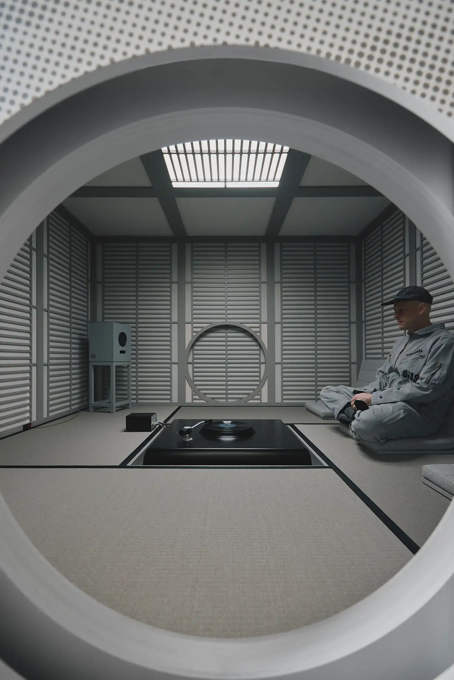 Devon Turnbull sits in meditation within the acoustic environment of the Sound House.
